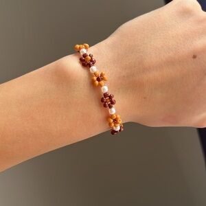5 for $25 Handmade sunflower/daisy seed bead bracelet with gold lobster clasp